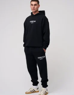 Baggy Leisure Club Cuffed Track Pants in Washed Black