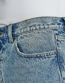 Distressed Relaxed Fit Denim Shorts in Acid Wash Blue
