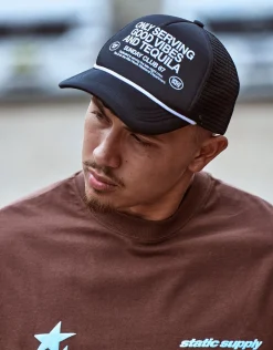 Good Vibes Trucker Hat in Camo/off White
