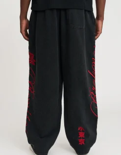 Los Angeles Rose Wide Leg Track Pants in Washed Black