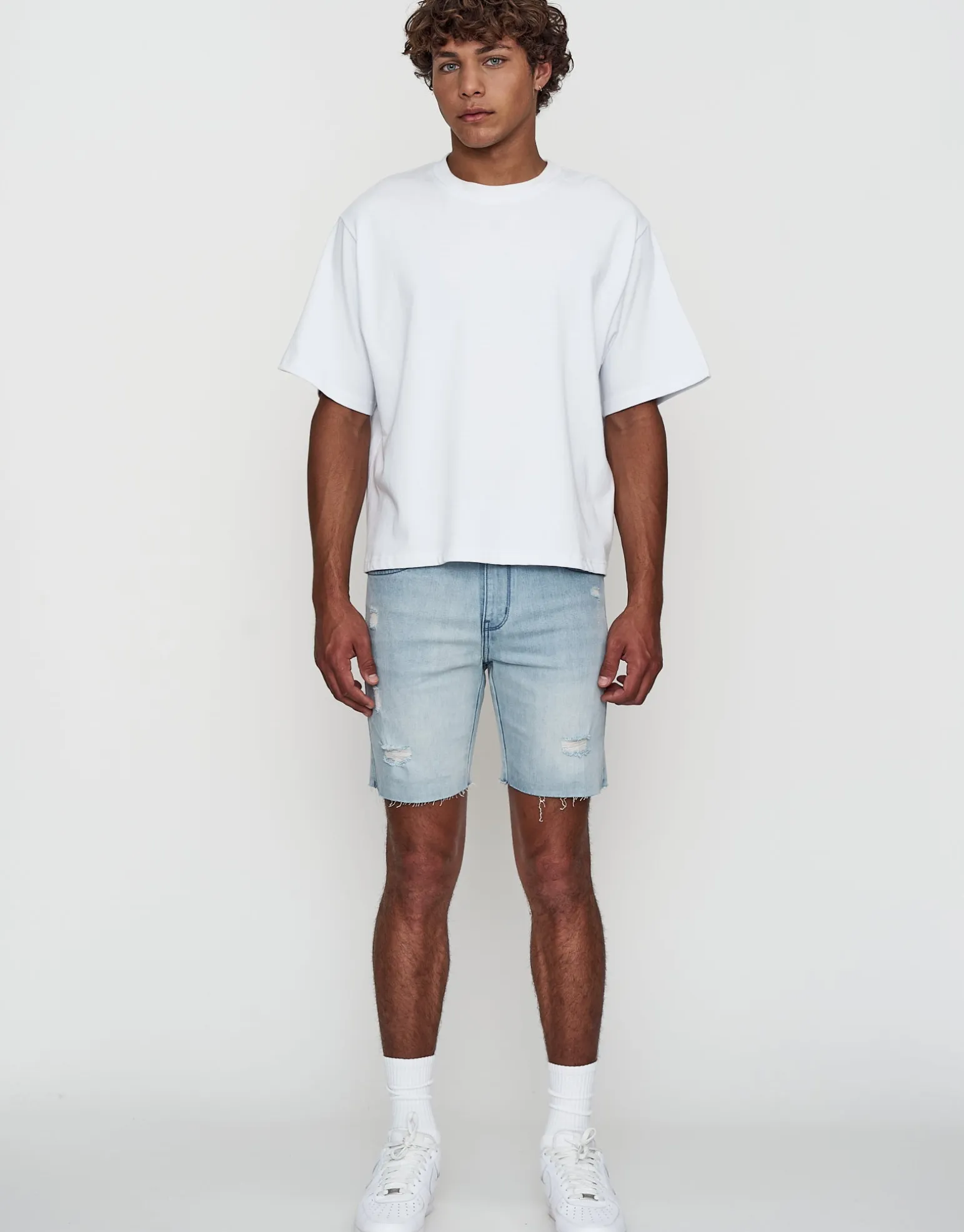 Skinny Rip Denim Shorts in Solid Black