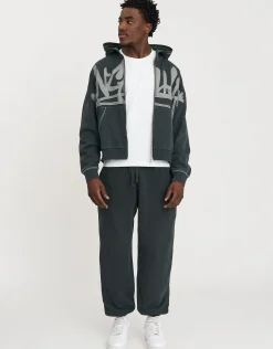 Vanguard Graffiti Baggy Track Pants in Washed Black